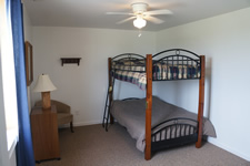 Bedroom with futon, queen and twin
